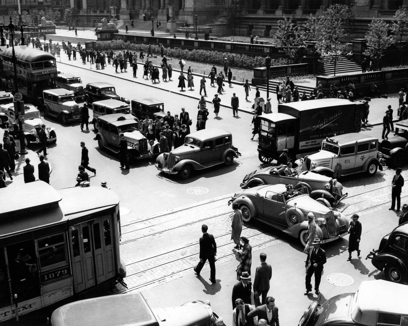 Intersection Of Fifth Avenue And 42Nd Street With Traffic Jam And Pedestrians, 1930S.