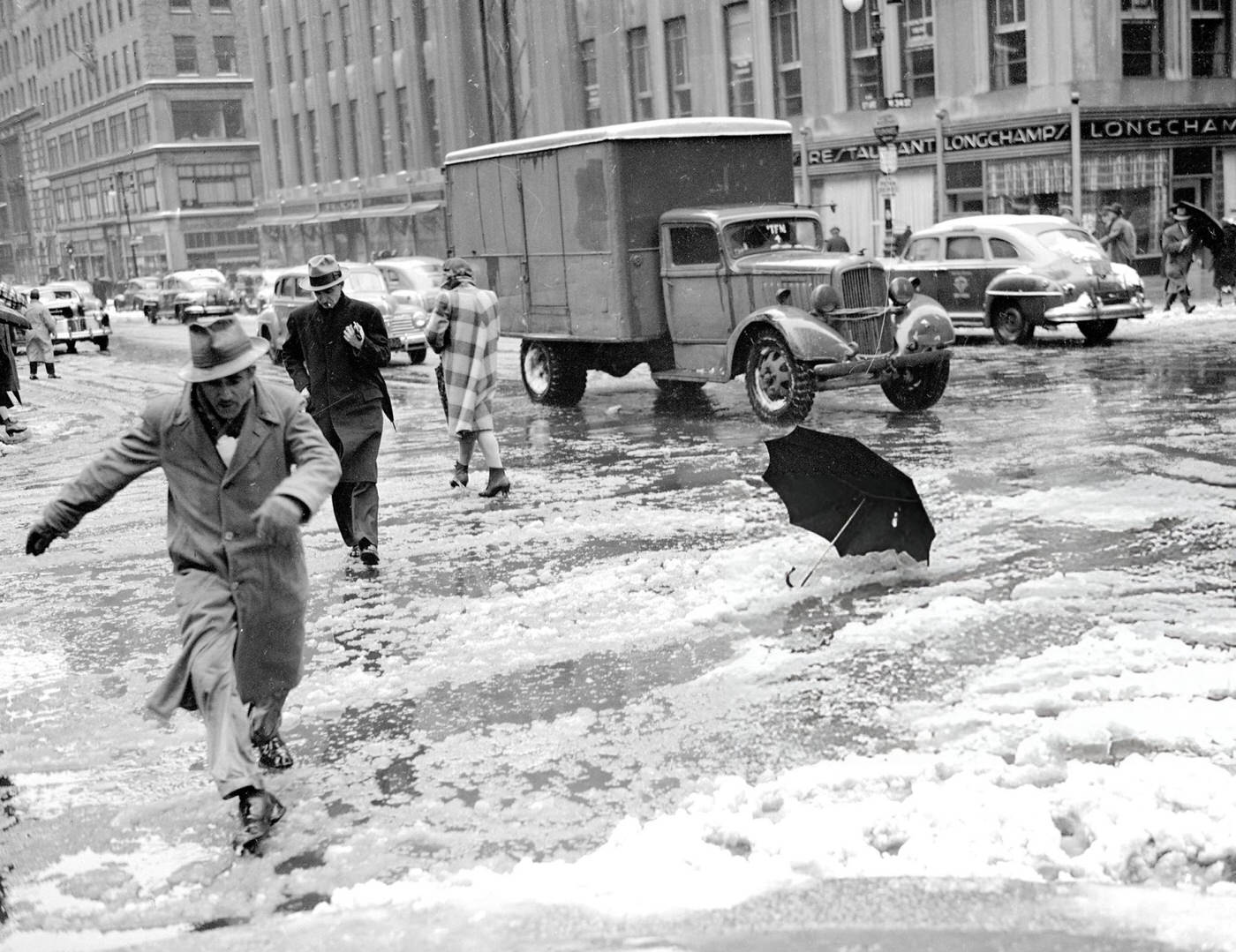 Man Leaping To Avoid Slush At Fifth Ave. And 34Th St.