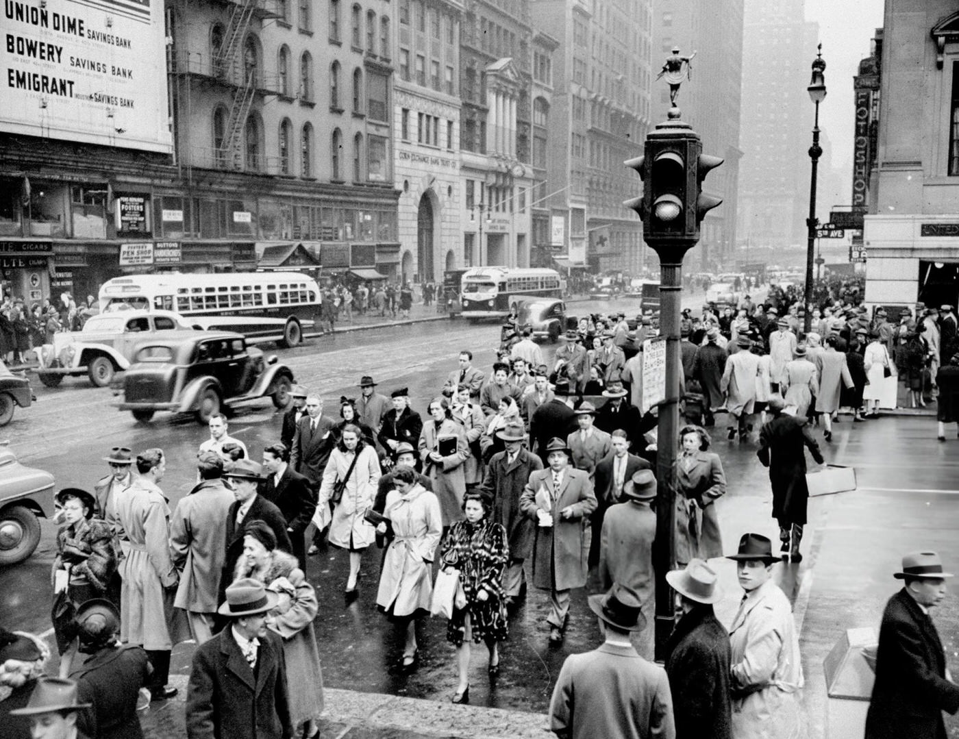 People Crossing Intersection At 42Nd Street And Fifth Ave