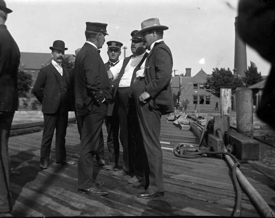 Officials Conferring On The Dock At North Brother Island Regarding The General Slocum Disaster, 1904.