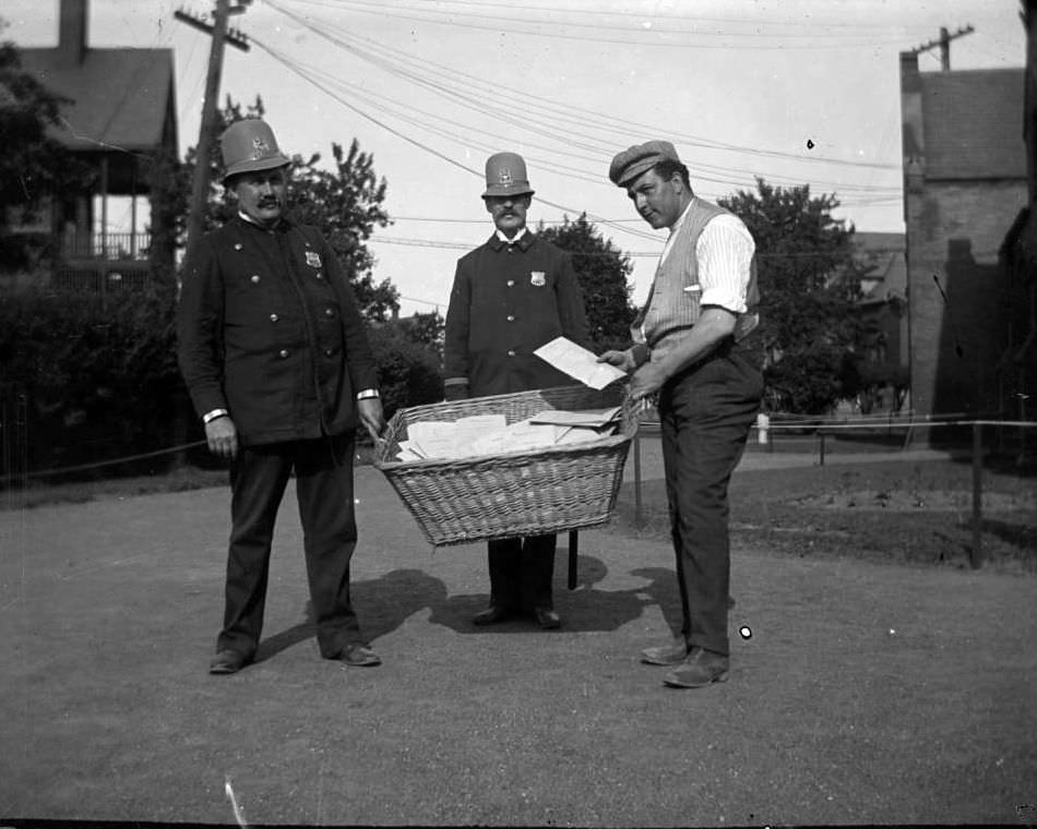 Police Officers And A Man With A Basket Full Of Documents Related To The General Slocum Disaster, North Brother Island, 1904.