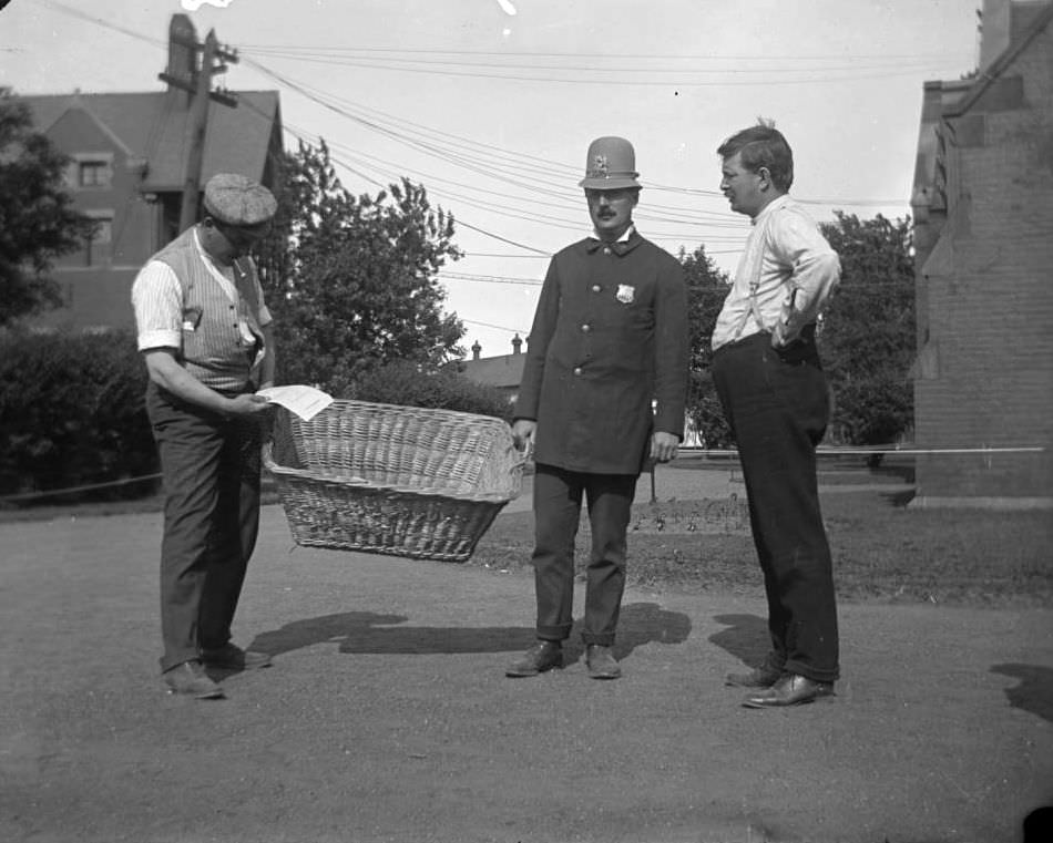 Police Officer And Two Men With A Basket Of Documents Related To The General Slocum Disaster, North Brother Island, 1904.