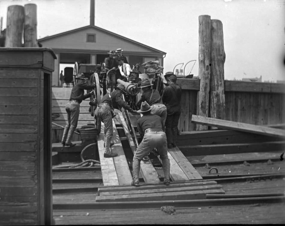 Men Of The Second Battery Moving A Gun Off A Pier, 1904.