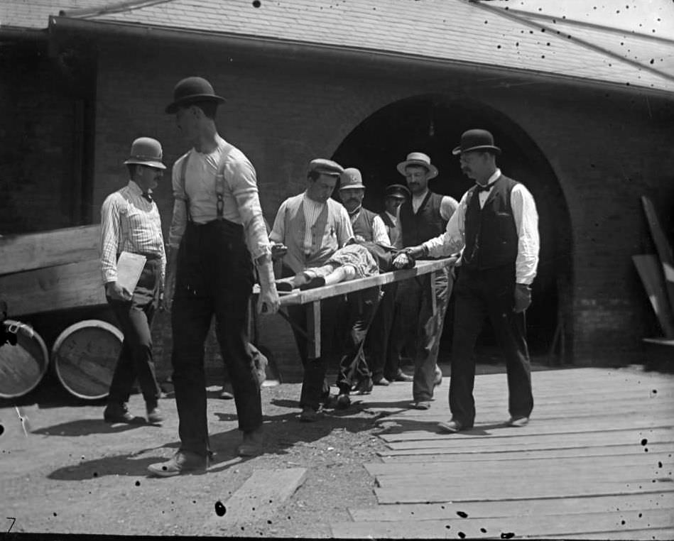 Men Carrying A Victim Of The General Slocum Disaster, North Brother Island, 1904.