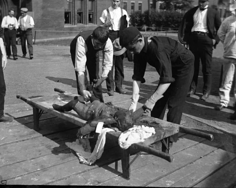 Two Men With The Body Of A Child From The General Slocum Disaster, North Brother Island, 1904.