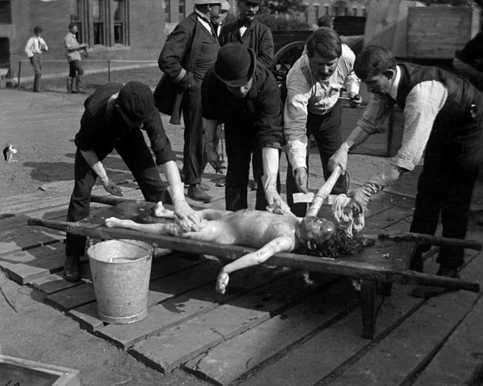 Washing A Body From The General Slocum Disaster, North Brother Island, 1904.