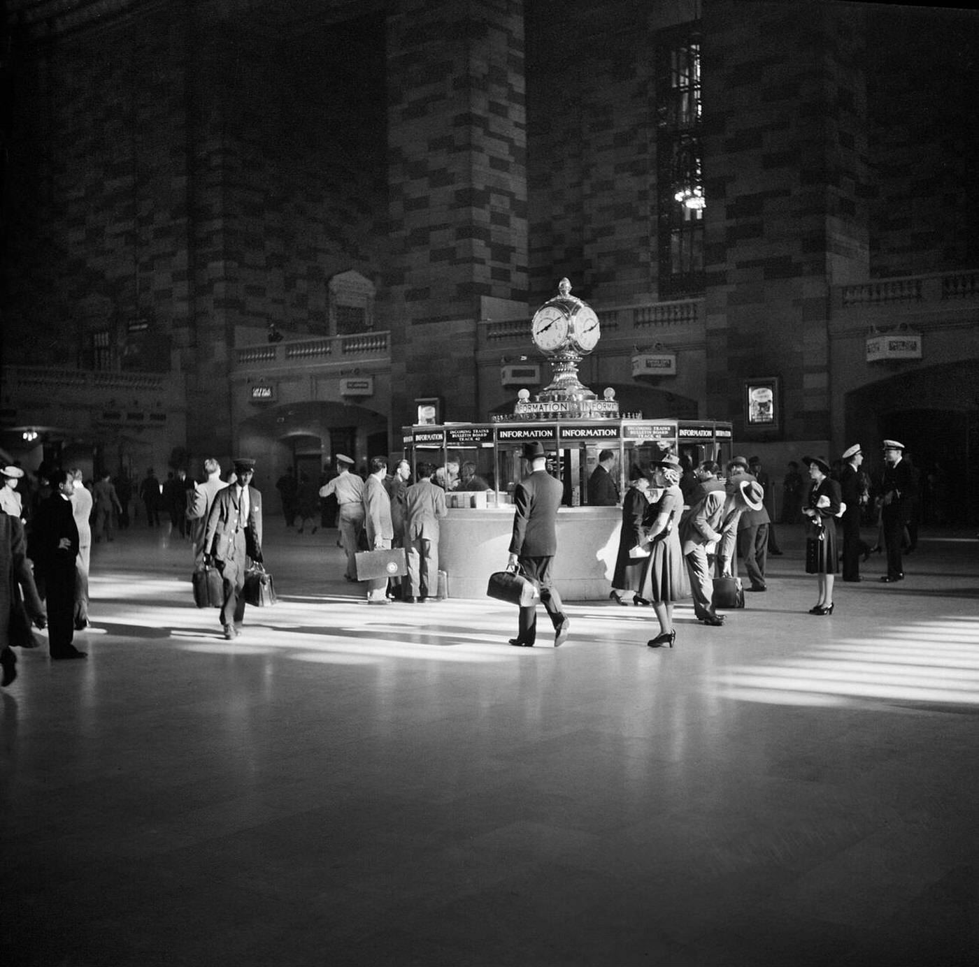 People Gathered Around Information Booth, Main Concourse, Grand Central Terminal, New York City, October 1941.