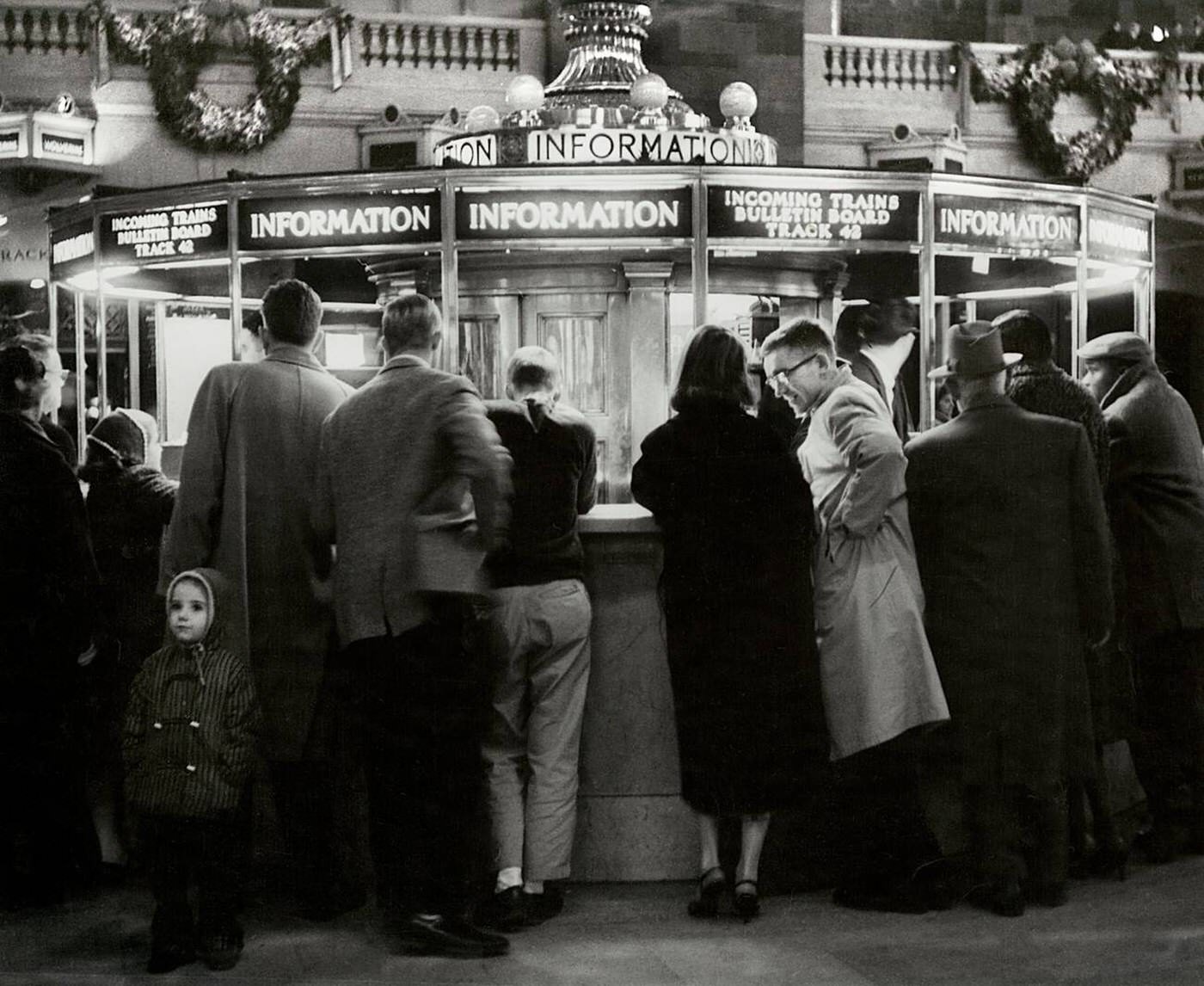 People Gathered Around Information Booth, Grand Central Terminal, New York City, December 1957.