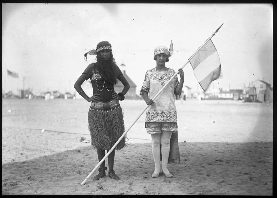 Two Young Women In Fancy Dress On The Beach, Ca. 1917.