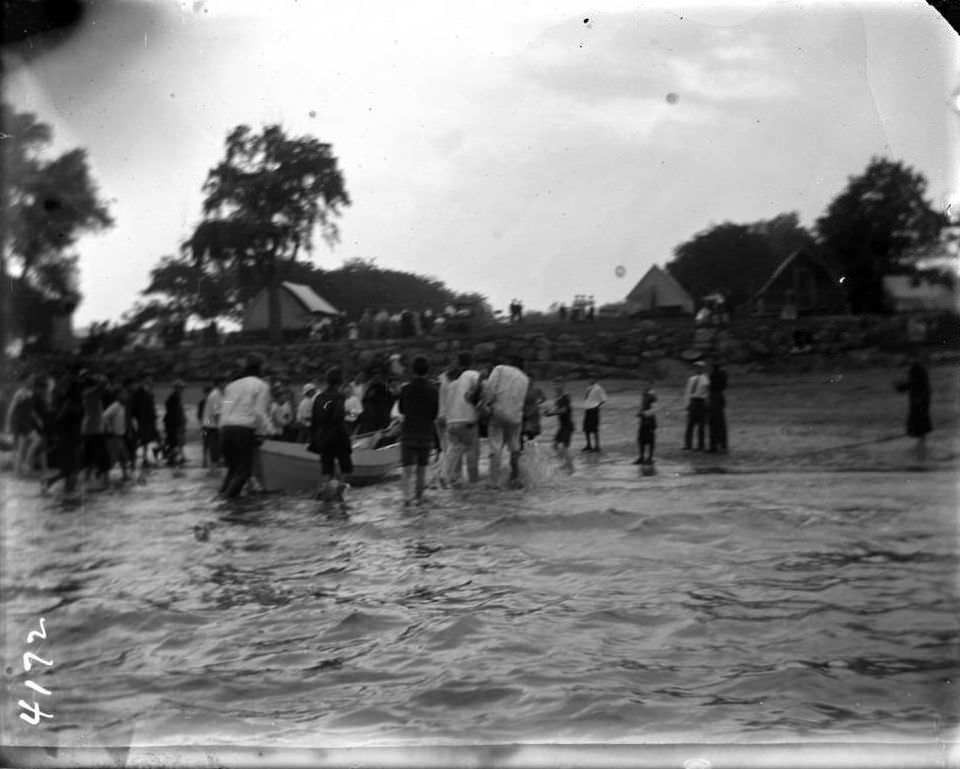 Bringing A Rowboat To Shore At Orchard Beach, Bronx, 1907.