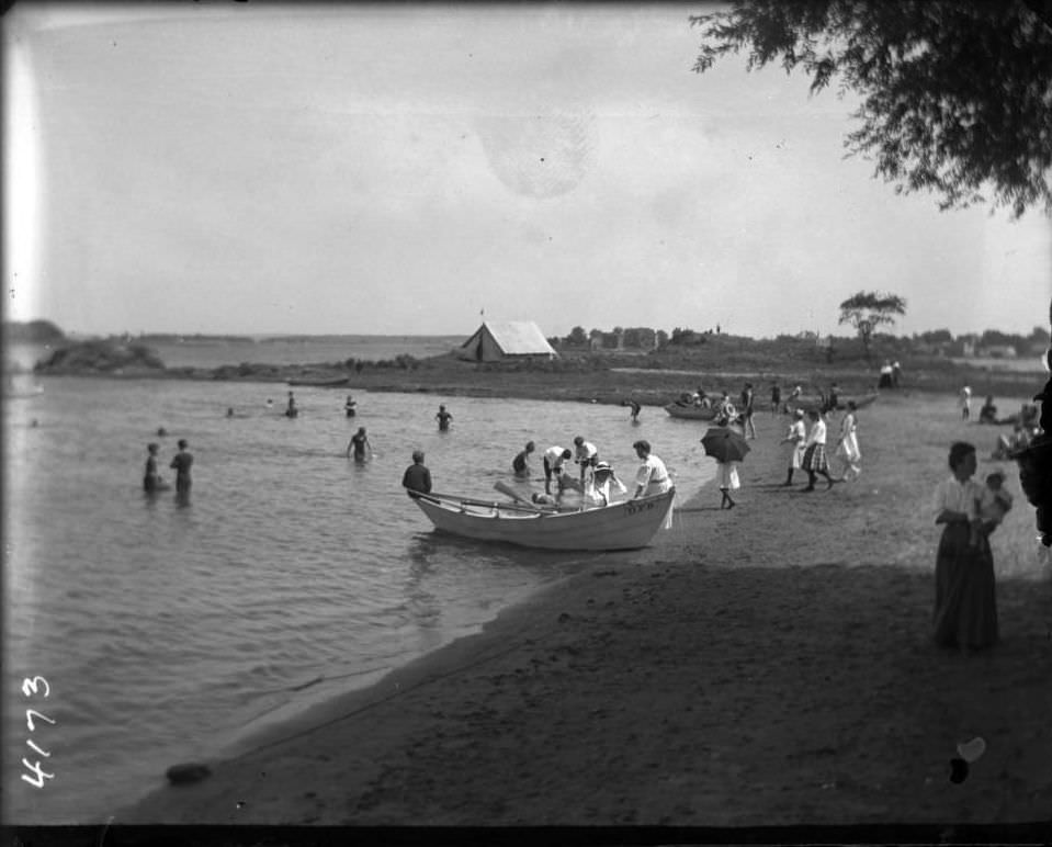 Bringing A Rowboat To Shore At Orchard Beach, Bronx, 1907.