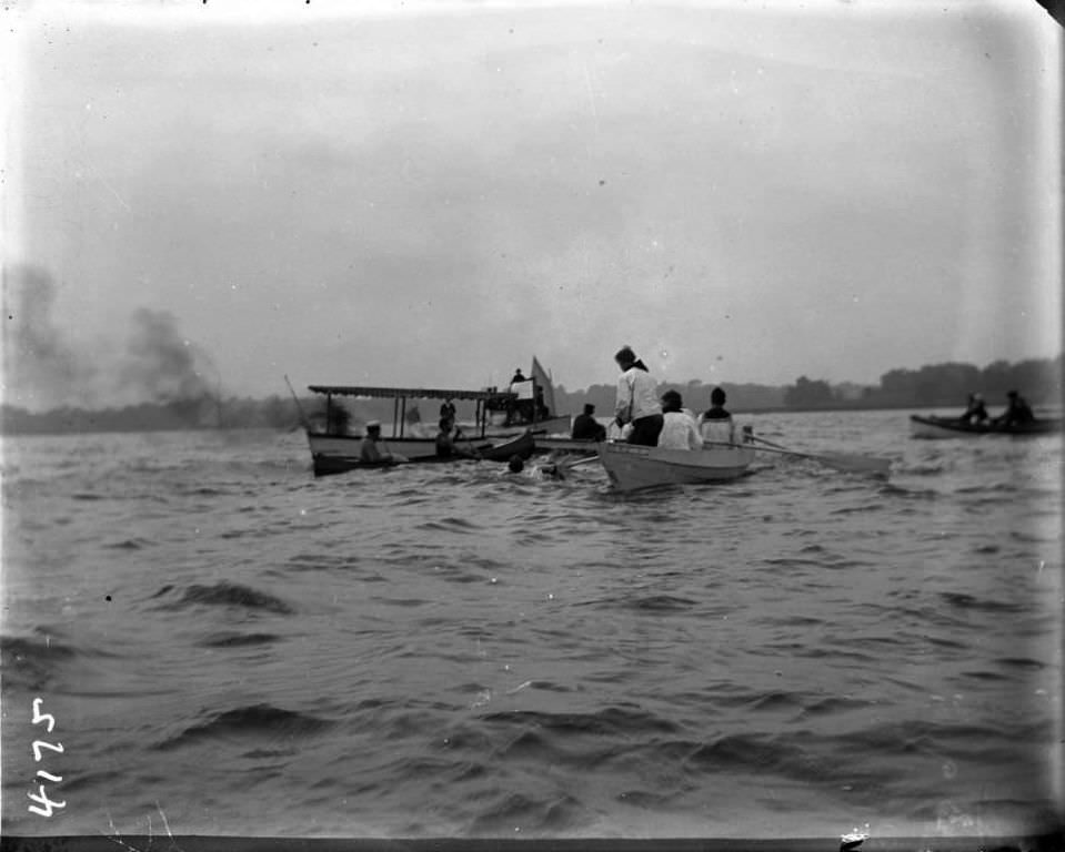 Lifeguards Rescuing A Man At Orchard Beach, Bronx, 1907.