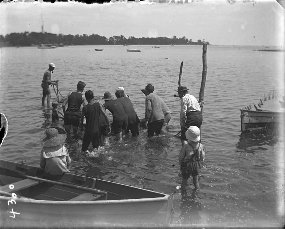 Men In The Water With A Raft At Orchard Beach, Bronx, 1910.