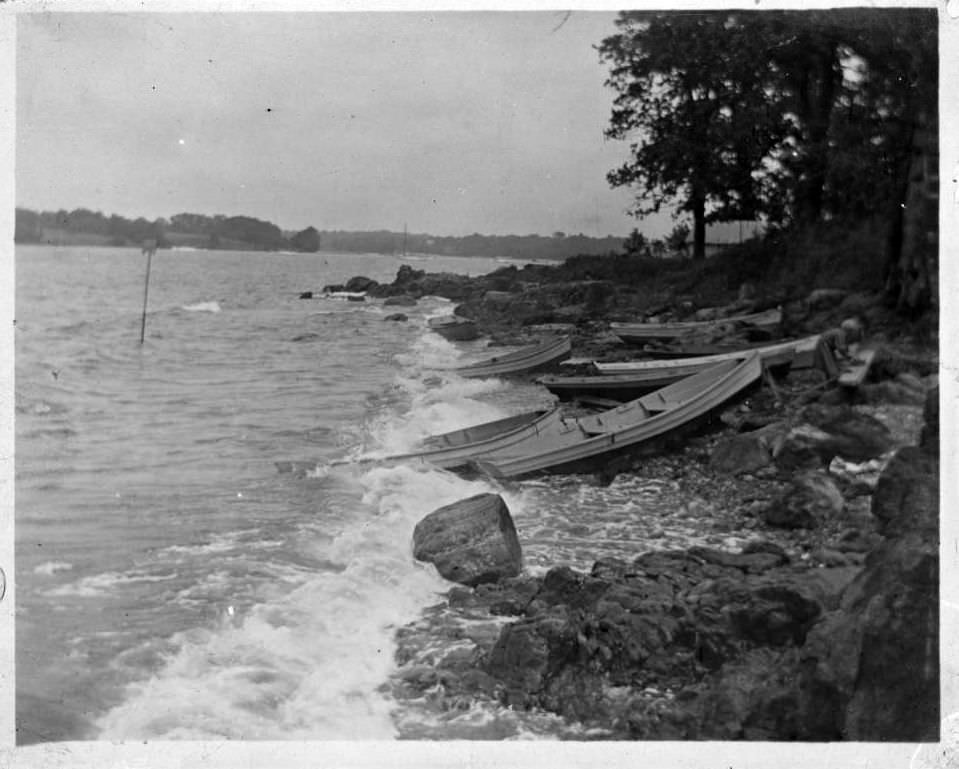 Rowboats Pulled Up Onto The Rocks At Orchard Beach, Bronx, 1909.