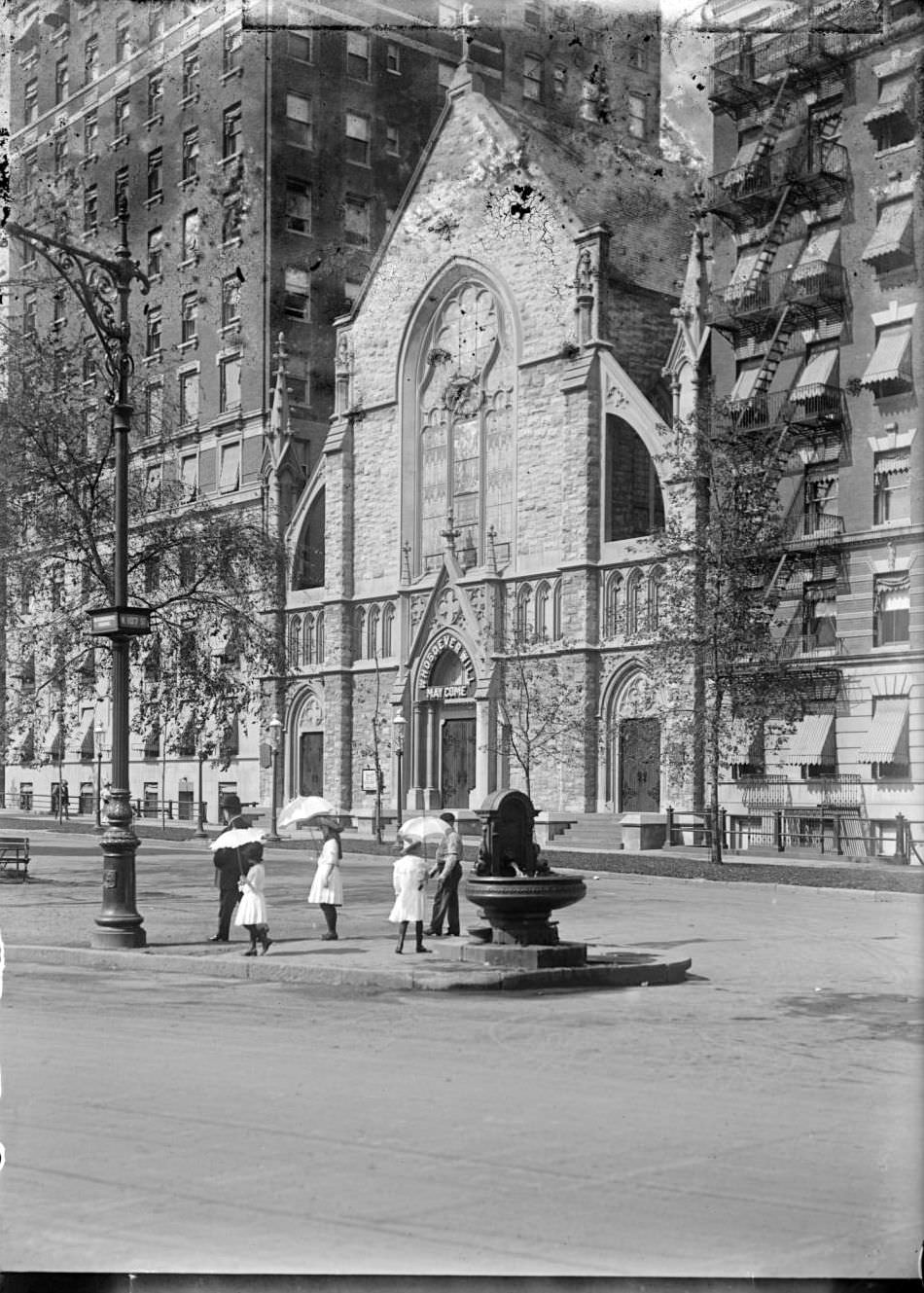 Girls In White With Umbrellas In Front Of The Bloomingdale Reformed Church, West End Avenue And W. 106Th Street, New York City, 1900S.