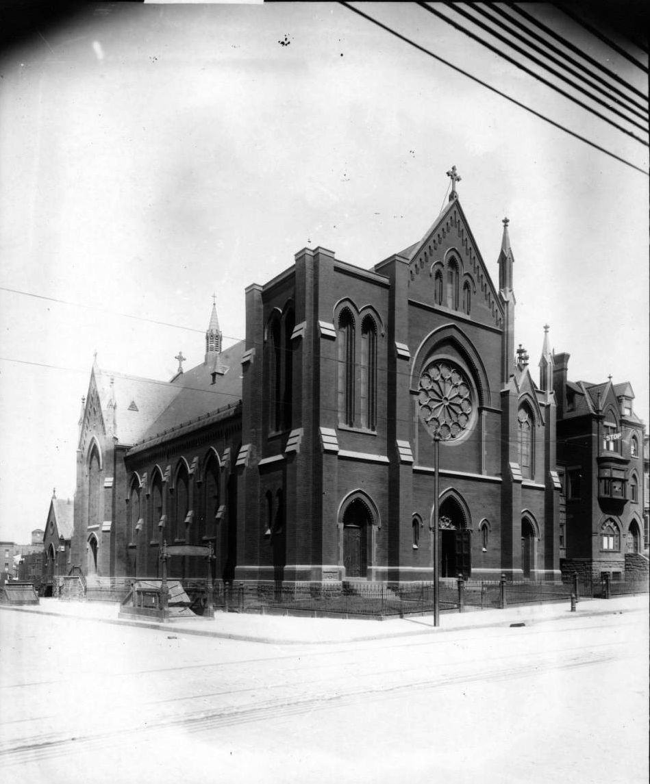 Gothic Brick Church With A Subway Entrance.