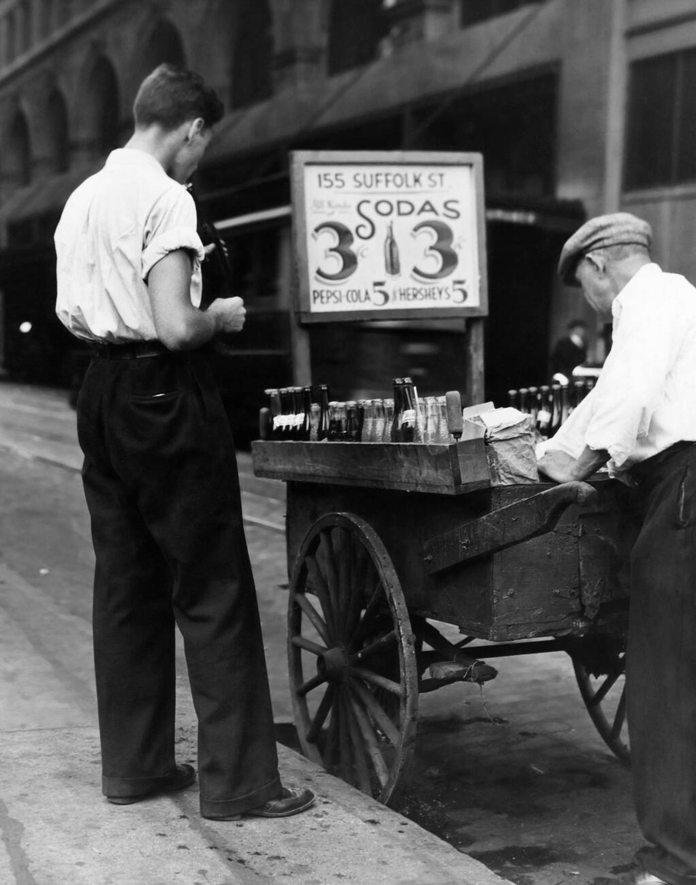 Young Man Customer And Sidewalk Street Vender With Handcart Selling Sodas For 3 Cents &Amp;Amp; 5 Cents For Pepsi Cola, 1930S.