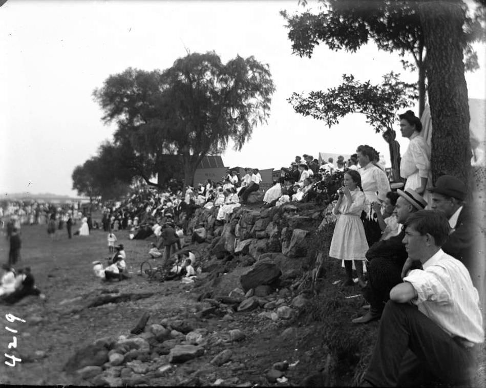 Spectators On The Beach Watching The Lifeguards At Orchard Beach, Bronx, 1908.