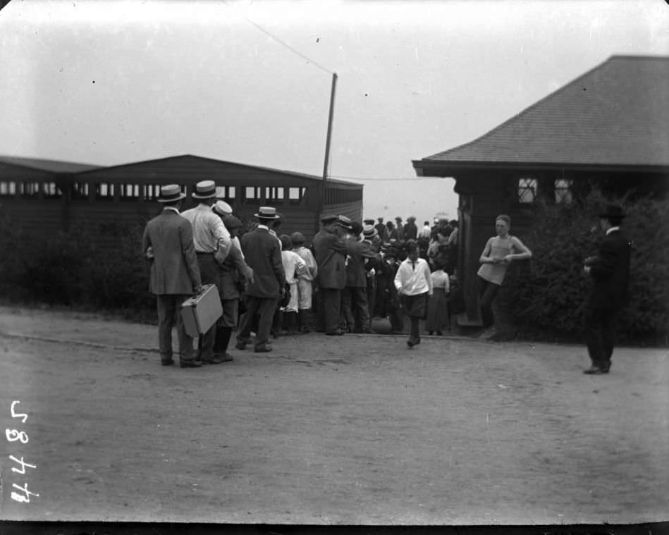 Line Waiting To Enter The Bathhouse At Orchard Beach, Bronx, 1915.