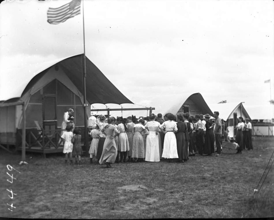 Unidentified Young Women Walking Through The Campgrounds At Orchard Beach, Bronx, 1912.