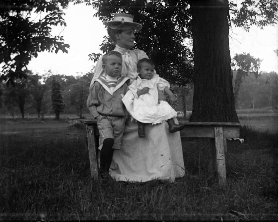 A Toddler And Little Boy With Their Mother, Lohbauer Park, Throggs Neck, Pelham Bay, Bronx, 1898.
