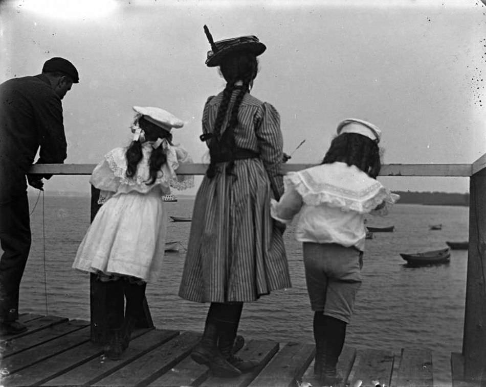 Children And Man On A Dock, Lohbauer Park, Throggs Neck, Pelham Bay, Bronx, 1898.