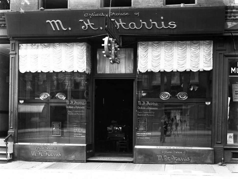 W. 125Th Street Storefront For M.h. Harris, Oculists And Opticians, 1918.