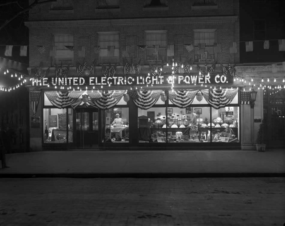 Illuminated Storefront And Sign Of An Unidentified United Electric Light &Amp;Amp; Power Company Store, Ca. 1916.