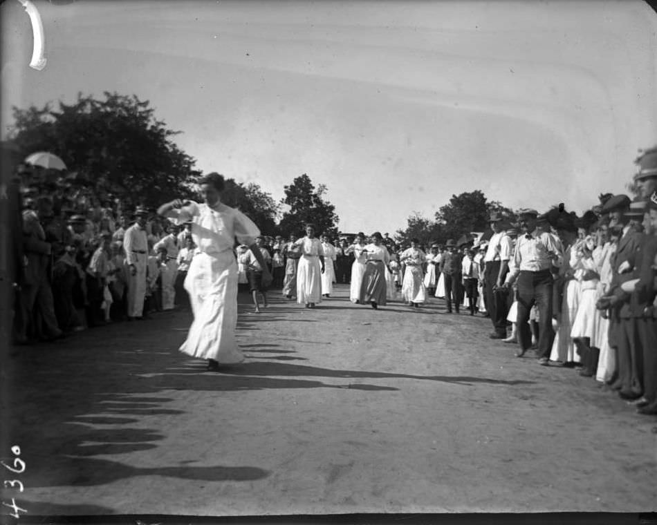 Women Running In An Egg-And-Spoon Race At Orchard Beach, Bronx, 1907.