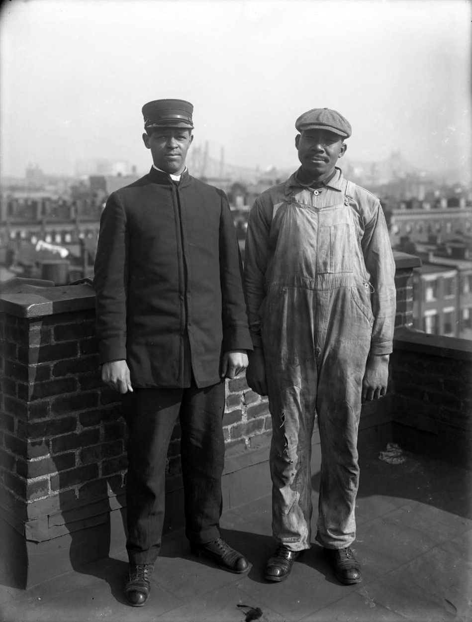 Two Men On The Roof Of A Building At 46Th Street And Lexington.