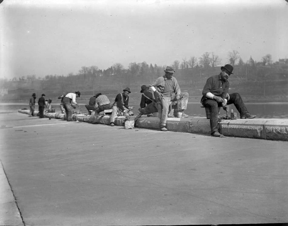 Workmen Working On The Curb Stones Near Speedway, New York City, 1900.