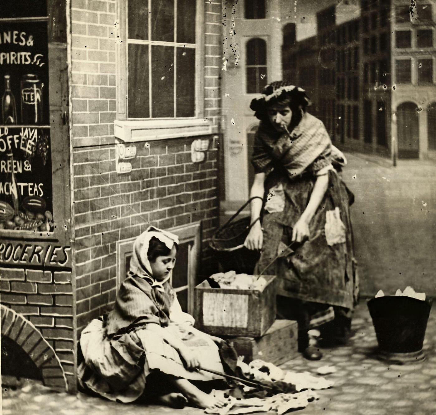 Mother And Daughter On Street Of Lower East Side Recreation On Film Or Stage Set, 1890S.
