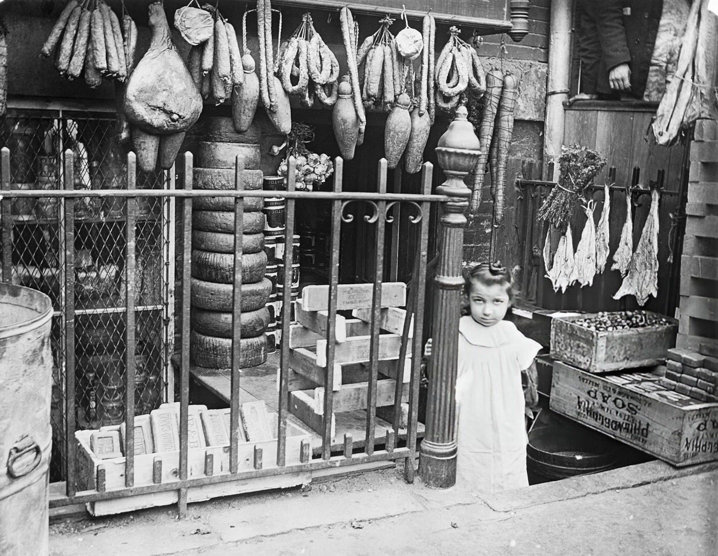 Outside An Italian Grocery Shop On New York'S Lower East Side.