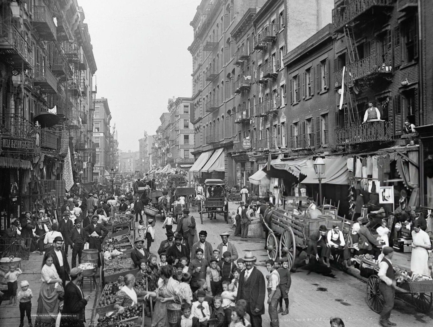 Pedestrians, Shoppers, And Merchants With Their Vendor Carts And Stalls On Mulberry Street, 1900.