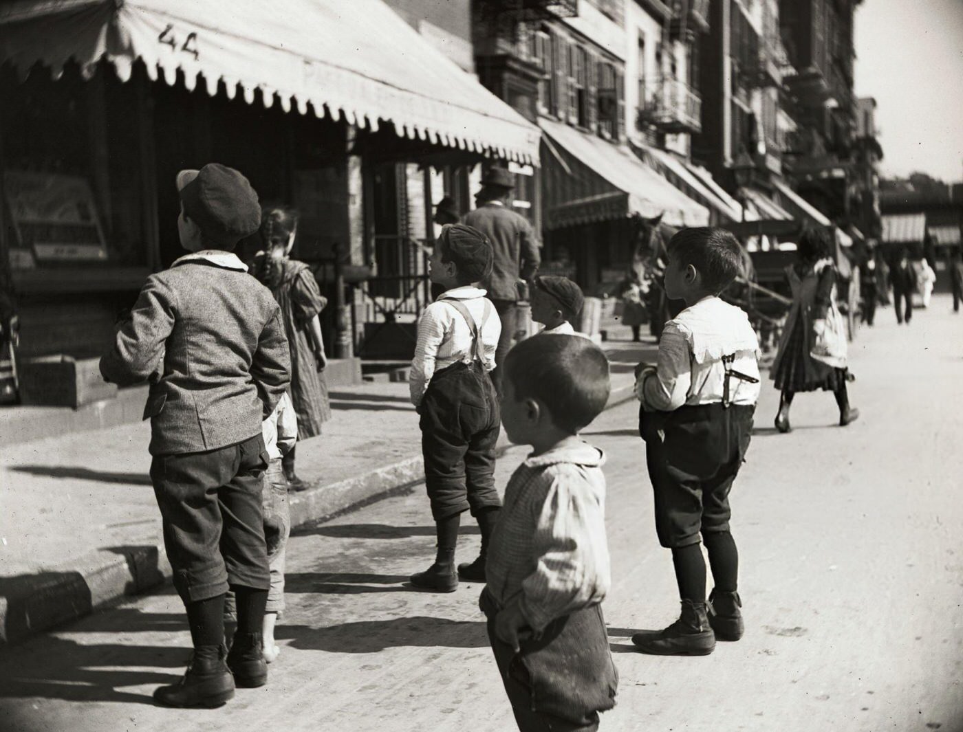 Four Young Boys Standing Together At Mulberry Street.