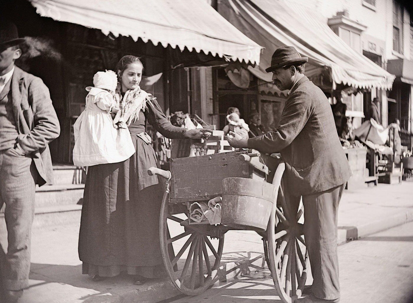 Woman Buying From Huckster With Pushcart At Mulberry Street, 1900.