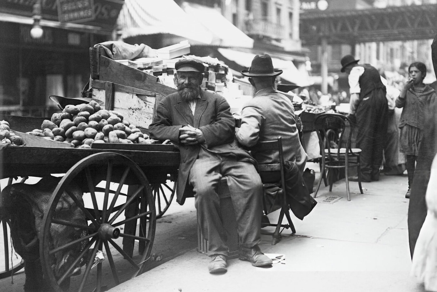 A Man Sells Potatoes On The Street From A Pushcart In The Lower East Side, Late 19Th Or Early 20Th Centuries.