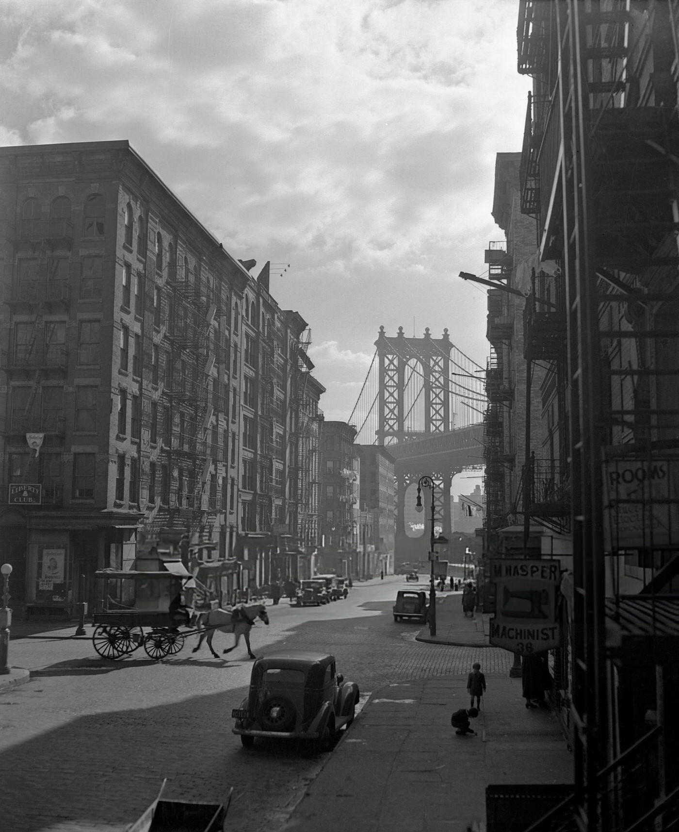 Pitt Street, On The East Side, Looking East From Canal Street, With The Manhattan Bridge In The Background.