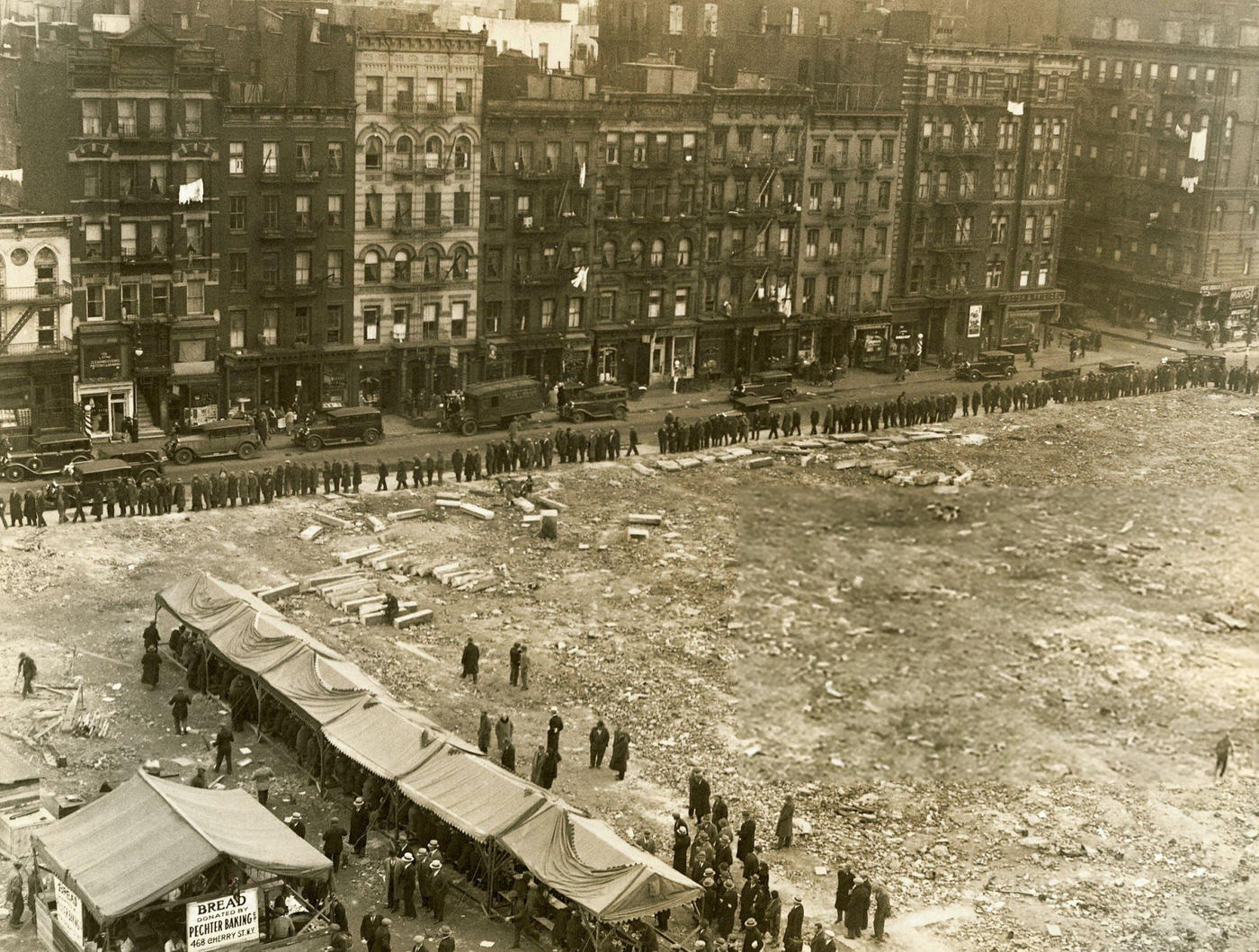 People Lining Up On Delancey Street In Lower East Side.