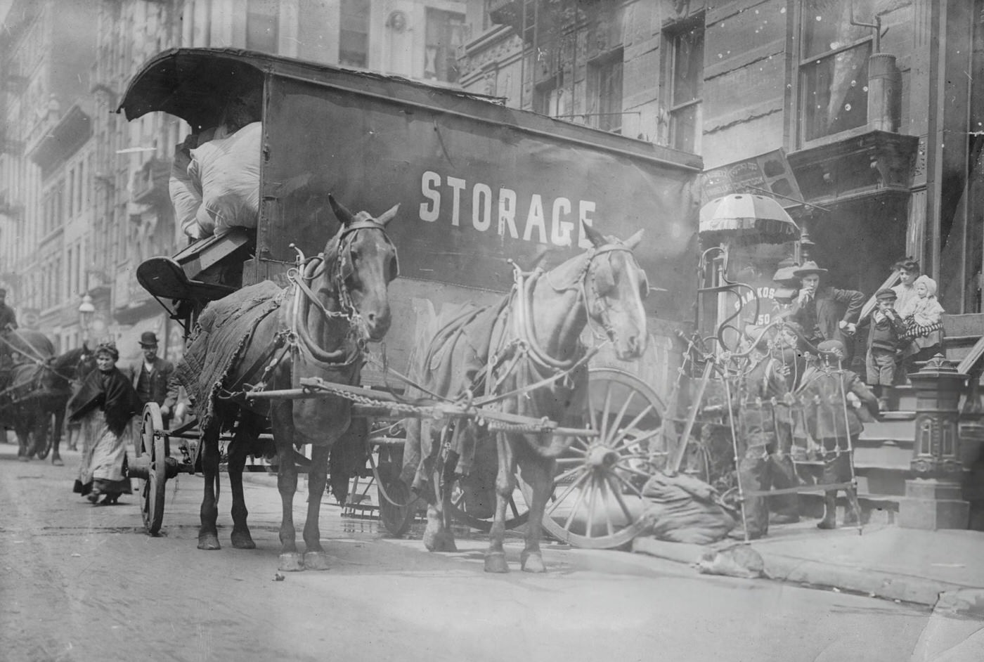 A Horse-Drawn Wagon Unloads The Home Content Of A Family Being Evicted From Their Home On New York'S Lower East Side, 1900.