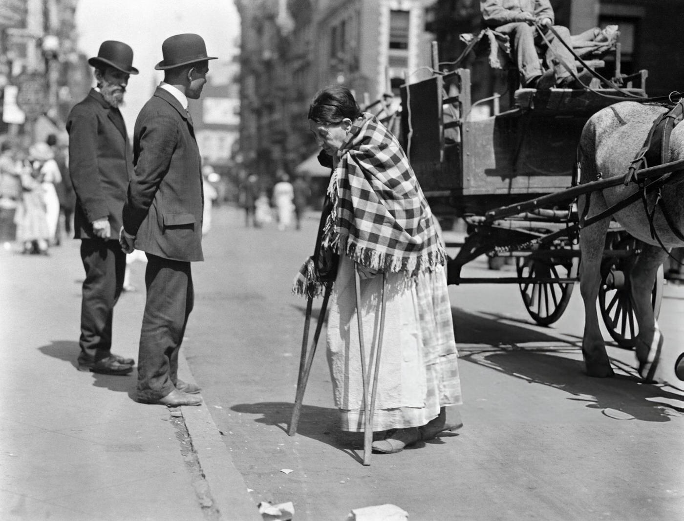 Elderly Woman Crossing Street On Crutches.