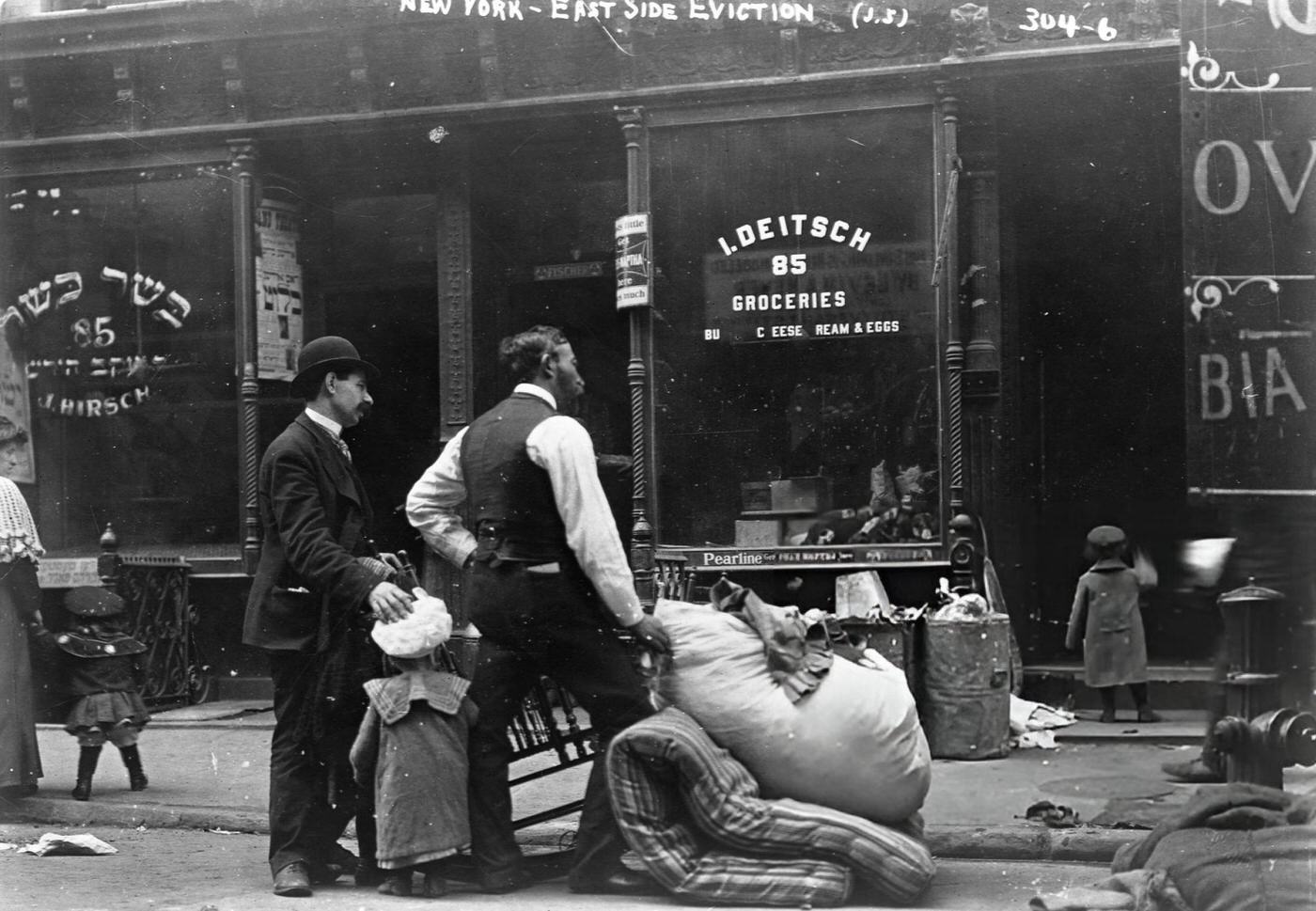 A Family Collects Their Belongings On A Lower East Side Street After Being Evicted.