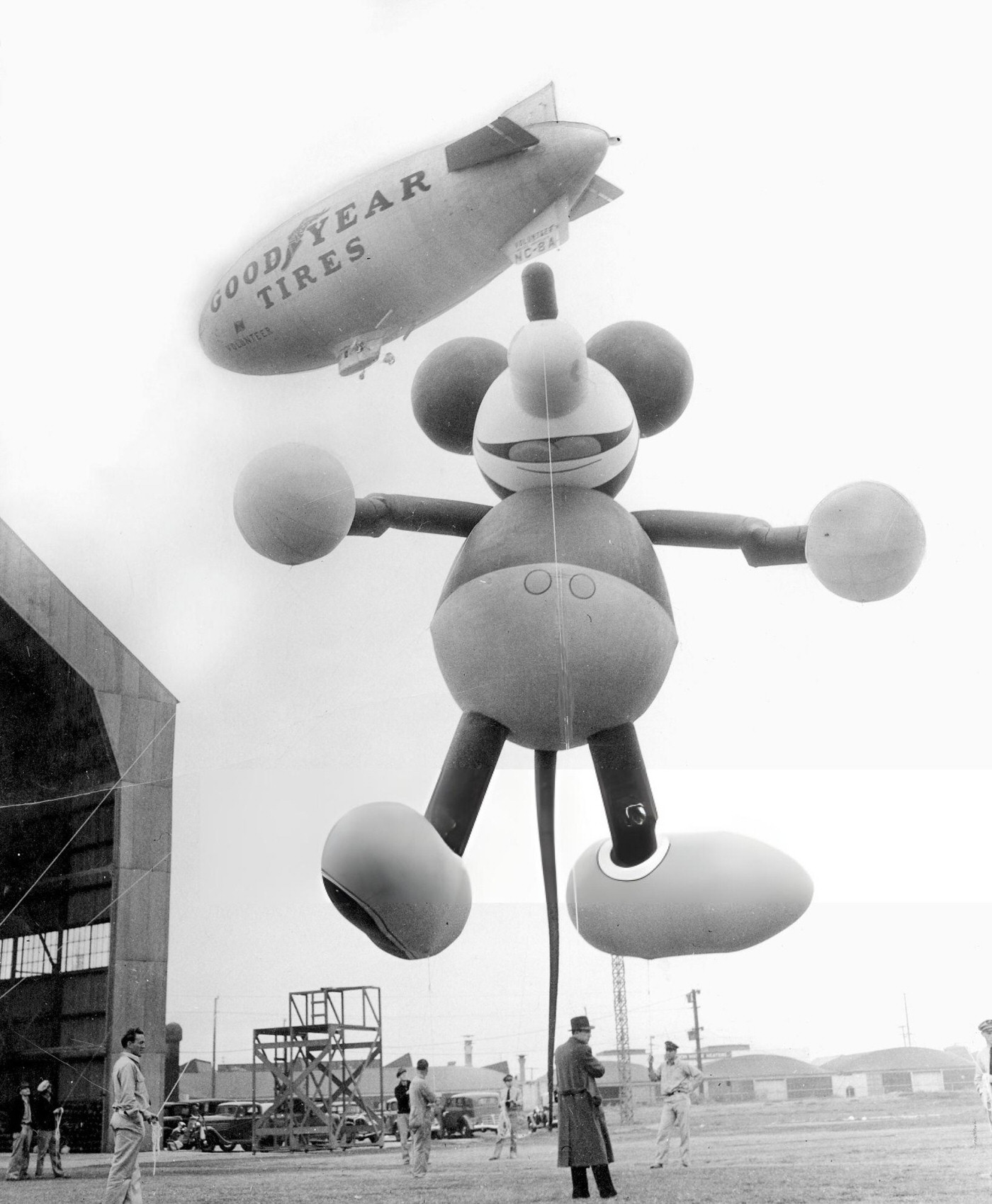 A Giant Mickey Mouse Balloon, Tied To A Dirigible In Glendale, California, Will Be A Feature Of Macy'S Thanksgiving Day Parade, Escorting Santa Claus Into New York, 1934.