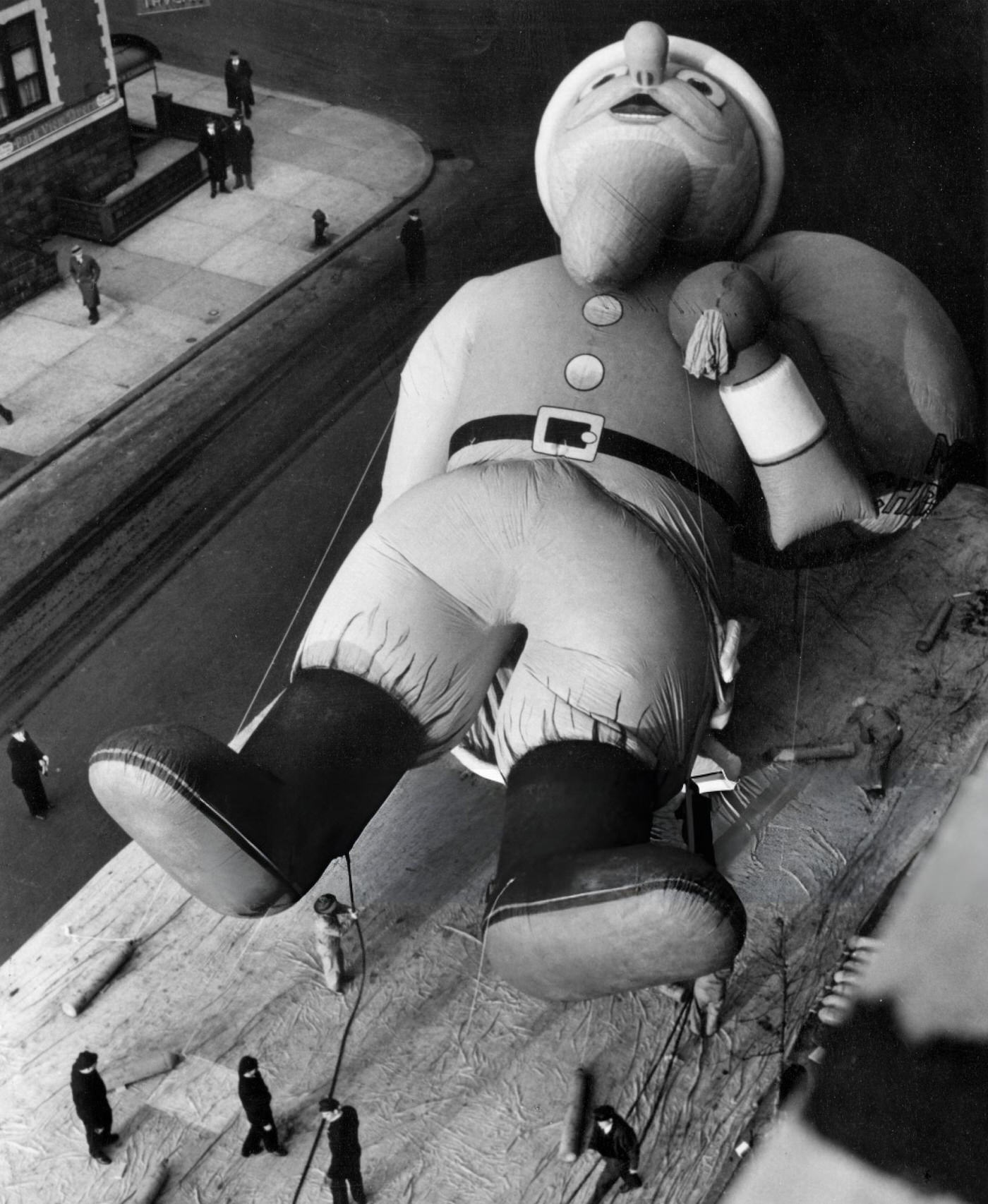 Workmen Inflate A Giant 45-Foot Santa Claus With Helium For The Macy'S Parade, New York, 1940.