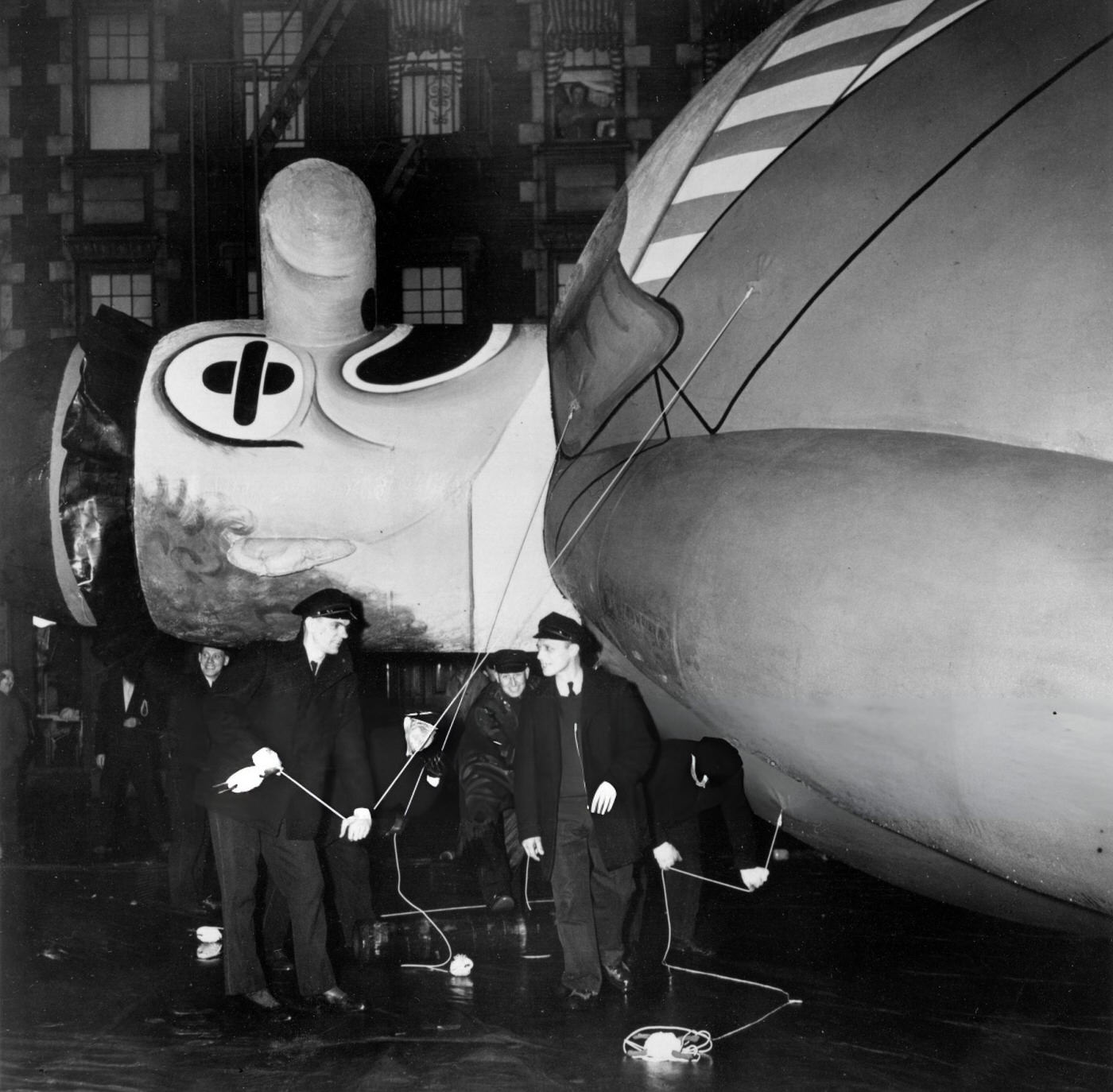 Crew Members Prepare To Erect The Giant Inflatable Macy'S Bobo The Hobo Balloon For The Macy'S Parade, New York, 1945.