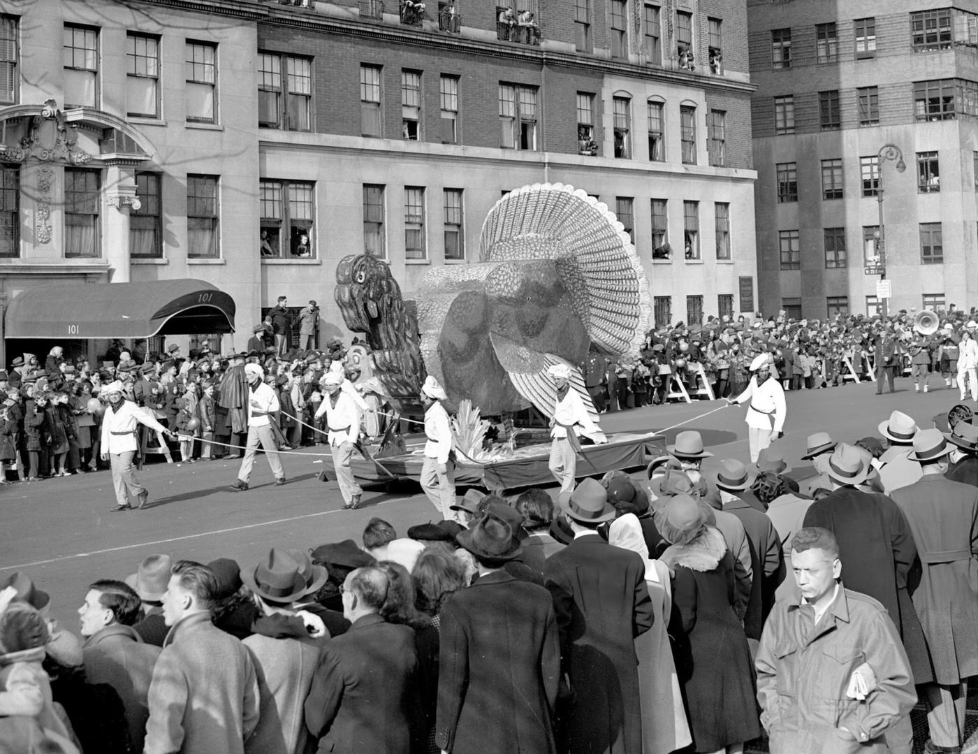 Children And Adults Line Central Park West To Watch Macy'S Thanksgiving Day Parade, Featuring A Large Turkey Balloon, 1945.