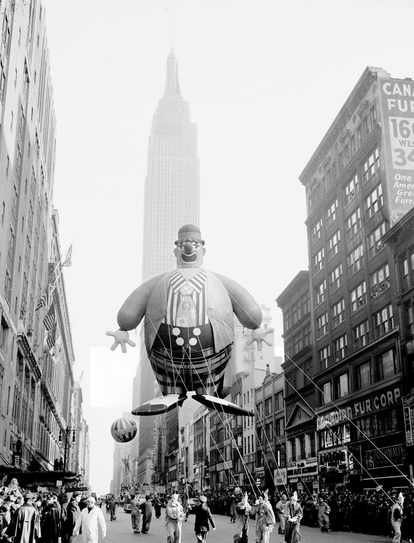 The 'Bobo The Hobo' Balloon, Designed By Elizabeth Rodgers And Produced By The Goodyear Company, Floats Along 34Th Street In The Macy'S Thanksgiving Parade, 1945.