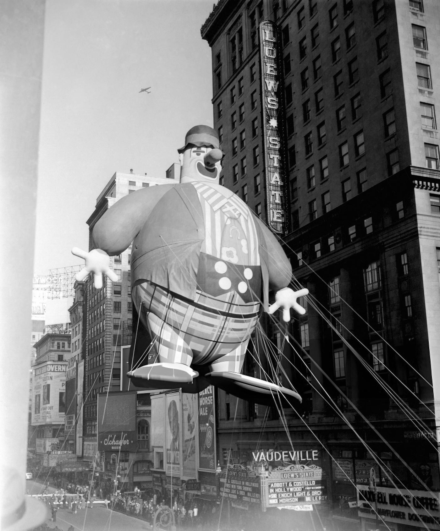 The 'Bobo The Hobo' Balloon Passes Overhead During The 1945 Macy'S Thanksgiving Day Parade, 1945.