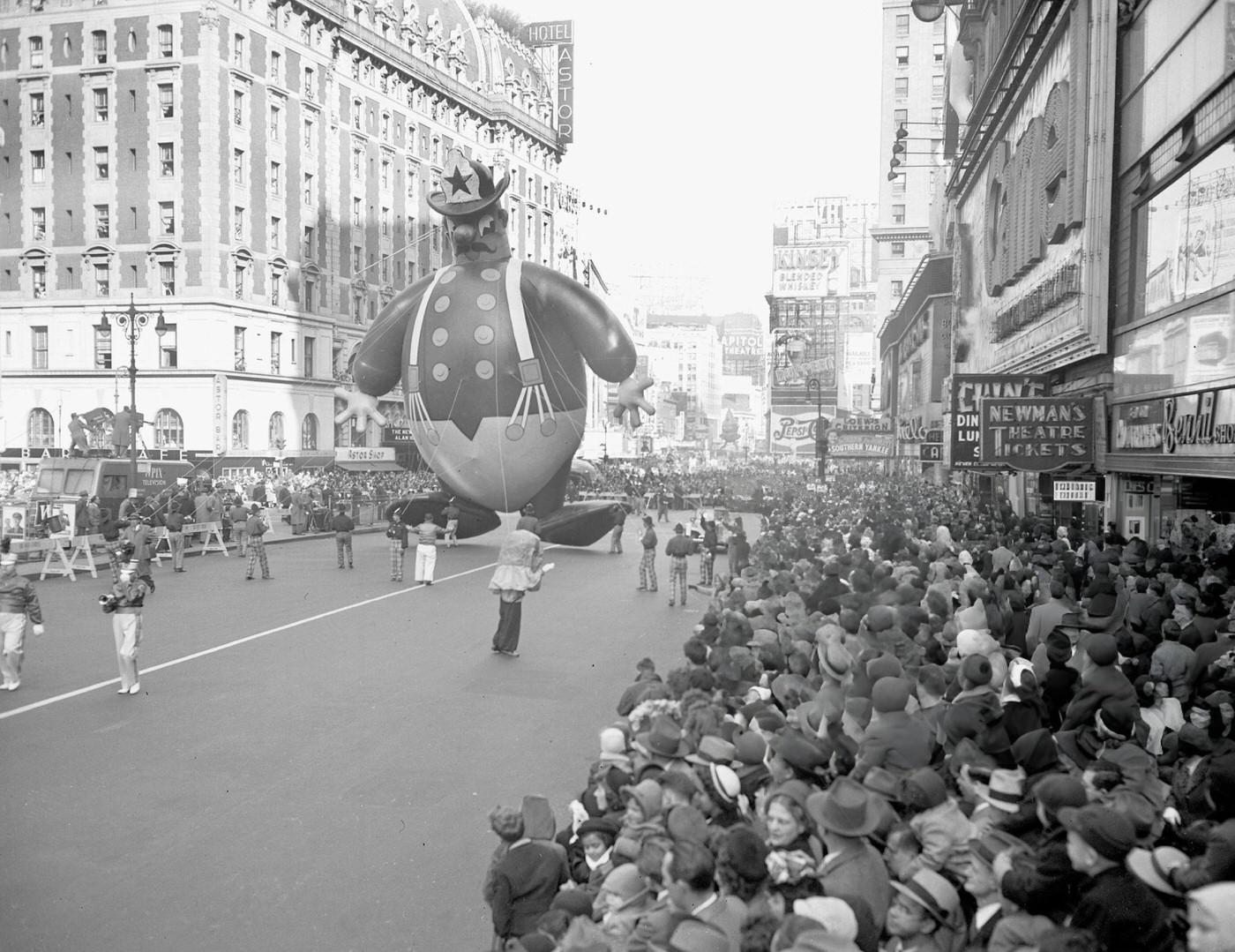 A Helium-Filled Fireman Surveys The Thousands Gathered In Times Square To See Macy'S Thanksgiving Day Parade, 1949.
