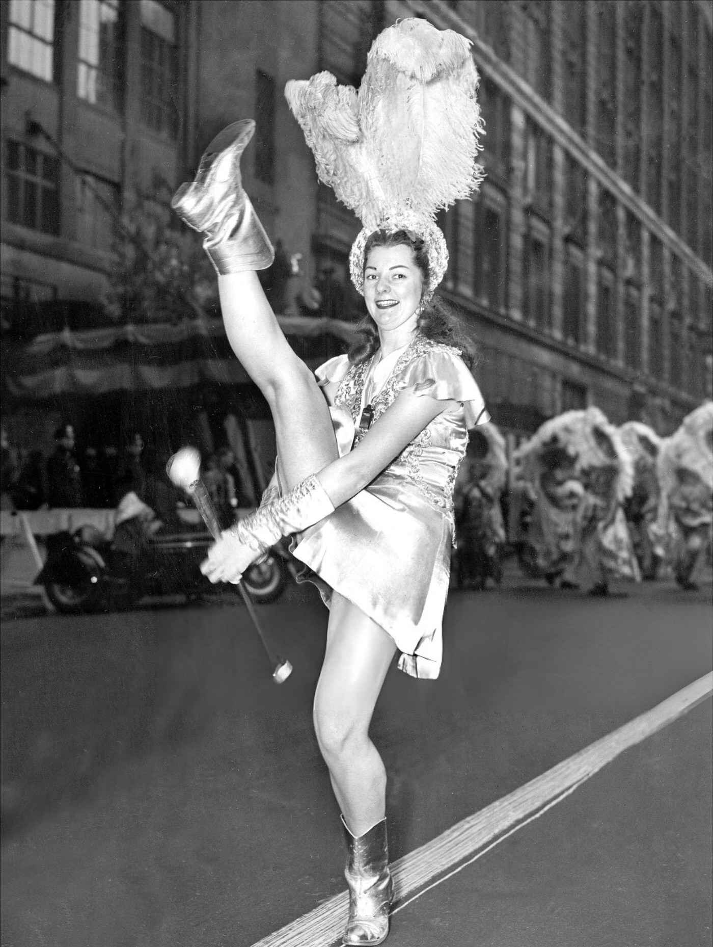 Alberta Dudeck Keeps Warm With High Kicks While Marching In Macy'S Thanksgiving Day Parade, 1949.